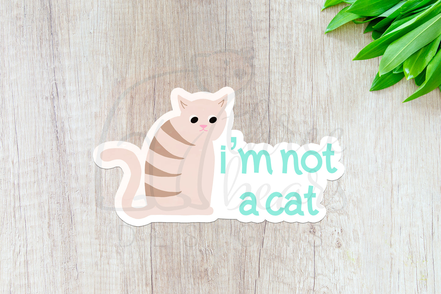 I'm Not a Cat Sticker — INDOOR USE ONLY